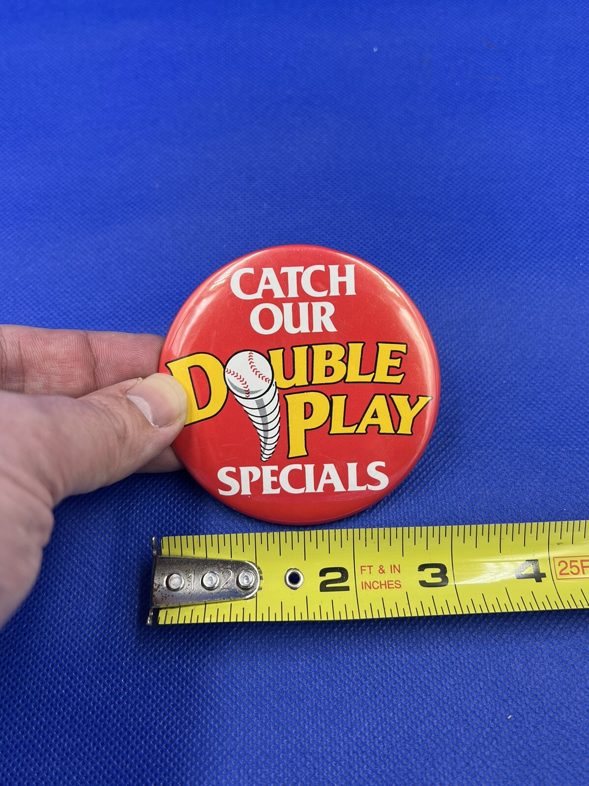 VINTAGE "Catch Our Double Play Specials” NOVELTY BUTTON - 3 1/4 DIA