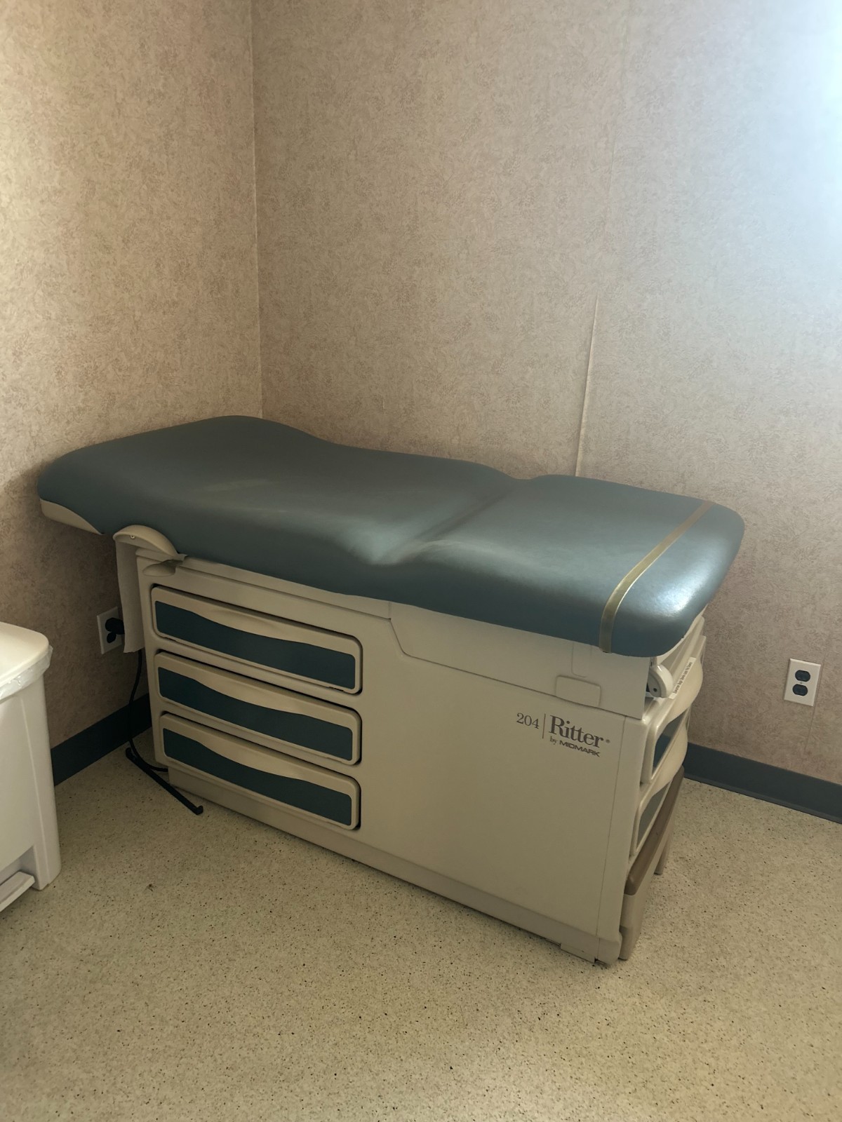 Medical exam table