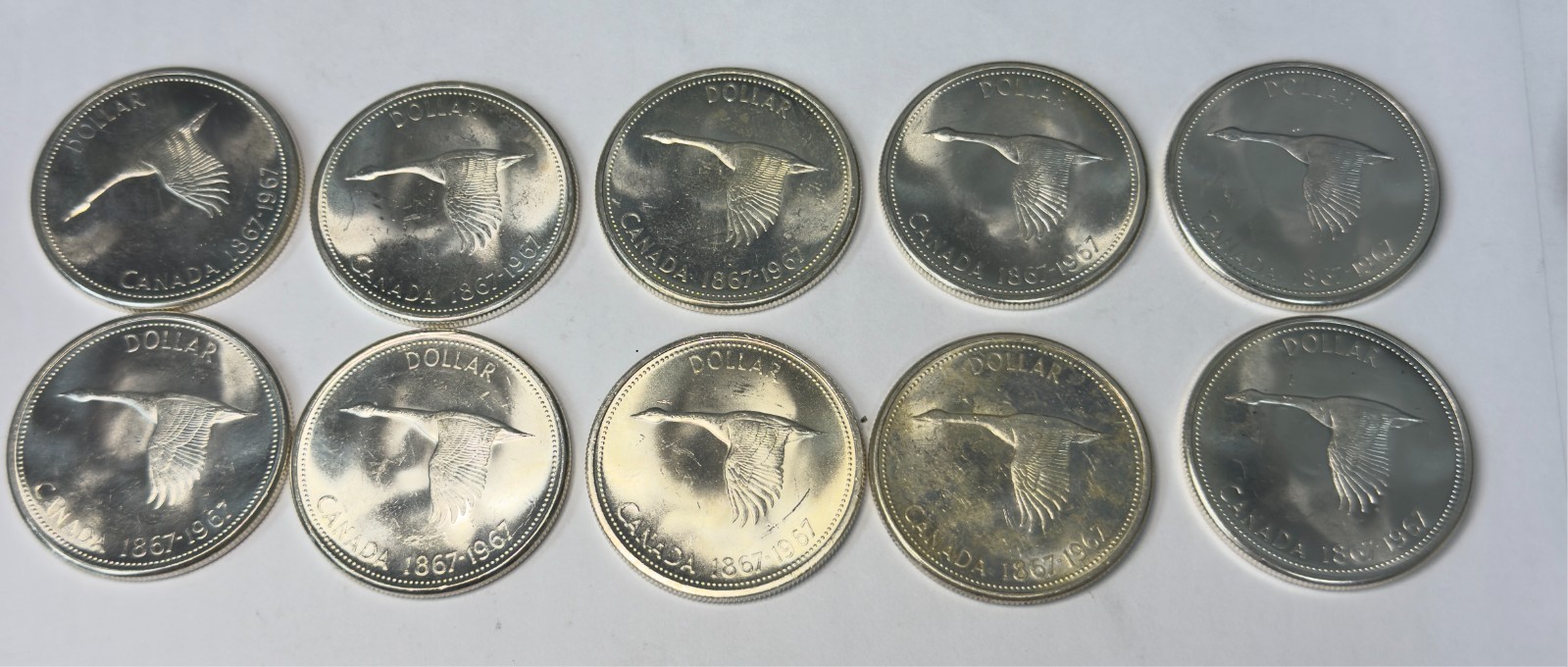 Lot of 10 1867-1967 Elizabeth II - Flying Goose Canadian Silver Dollar