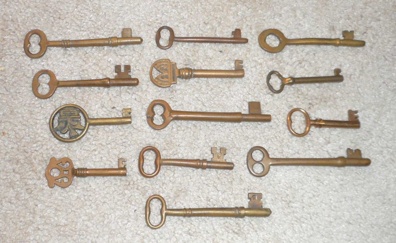 LOT OF 13 ANTIQUE BRASS SKELETON KEYS