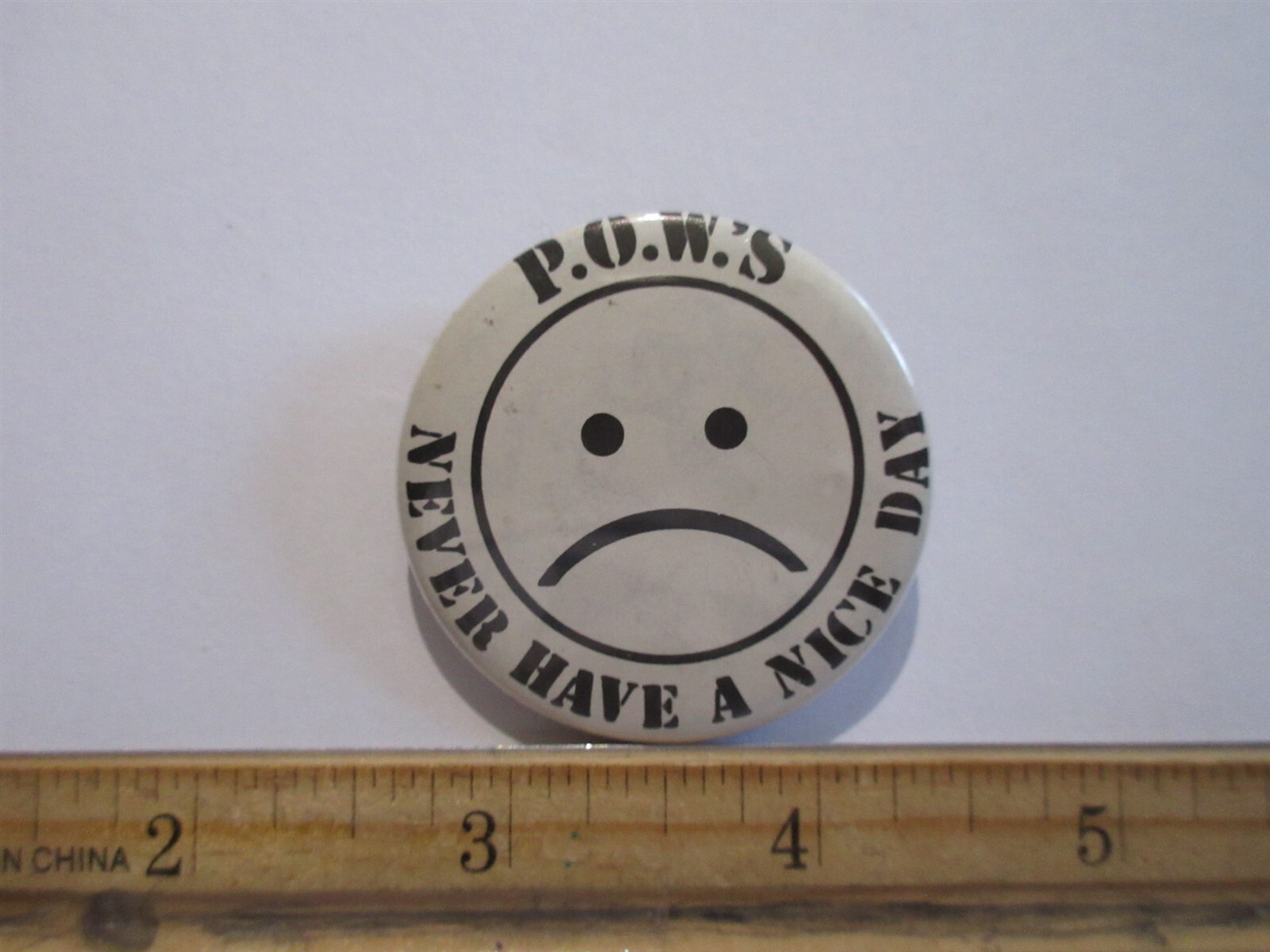 vintage POW's NEVER HAVE A NICE DAY button pin 1.75"