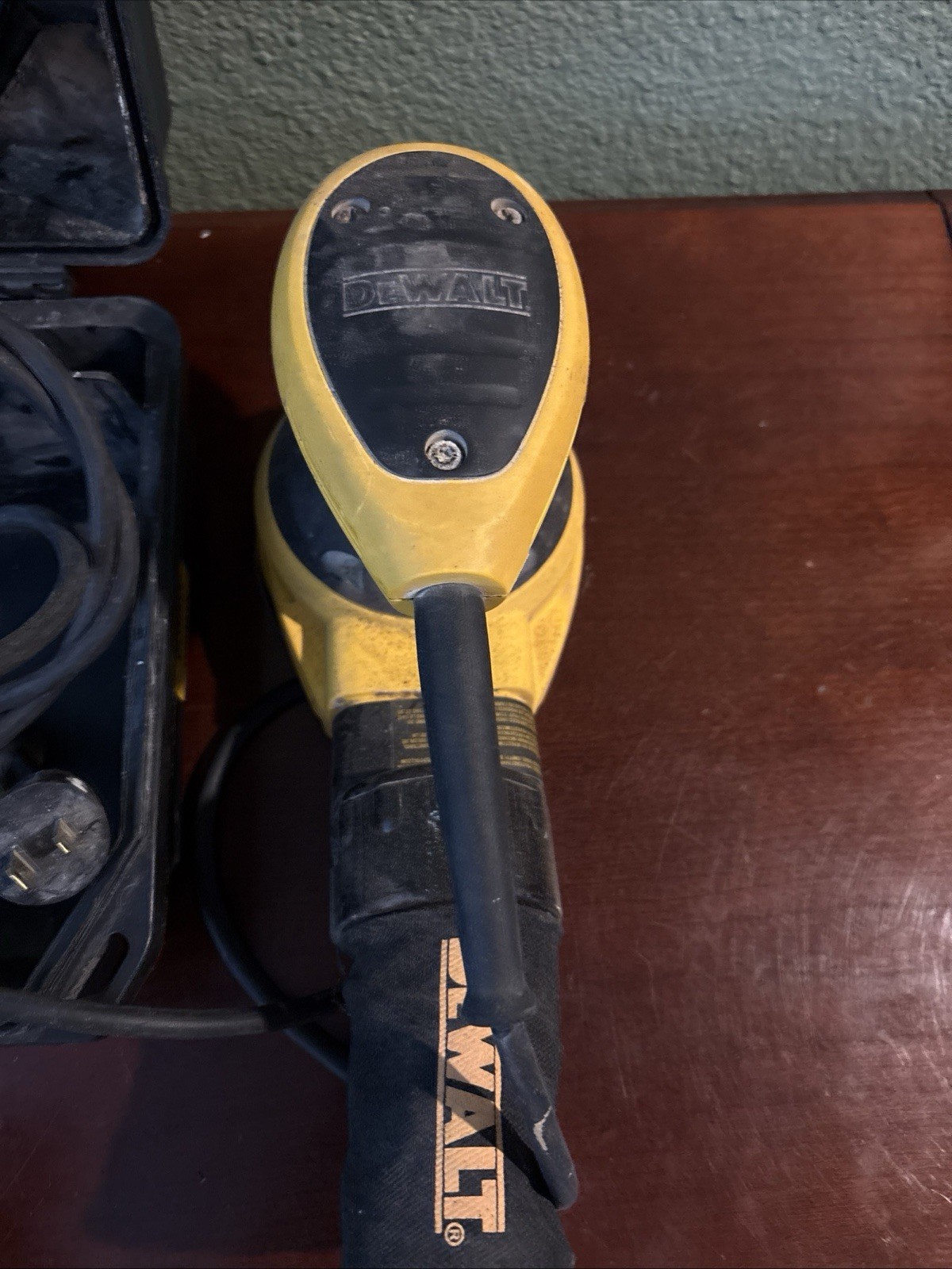 Dewalt Orbital Sander in a hard case.