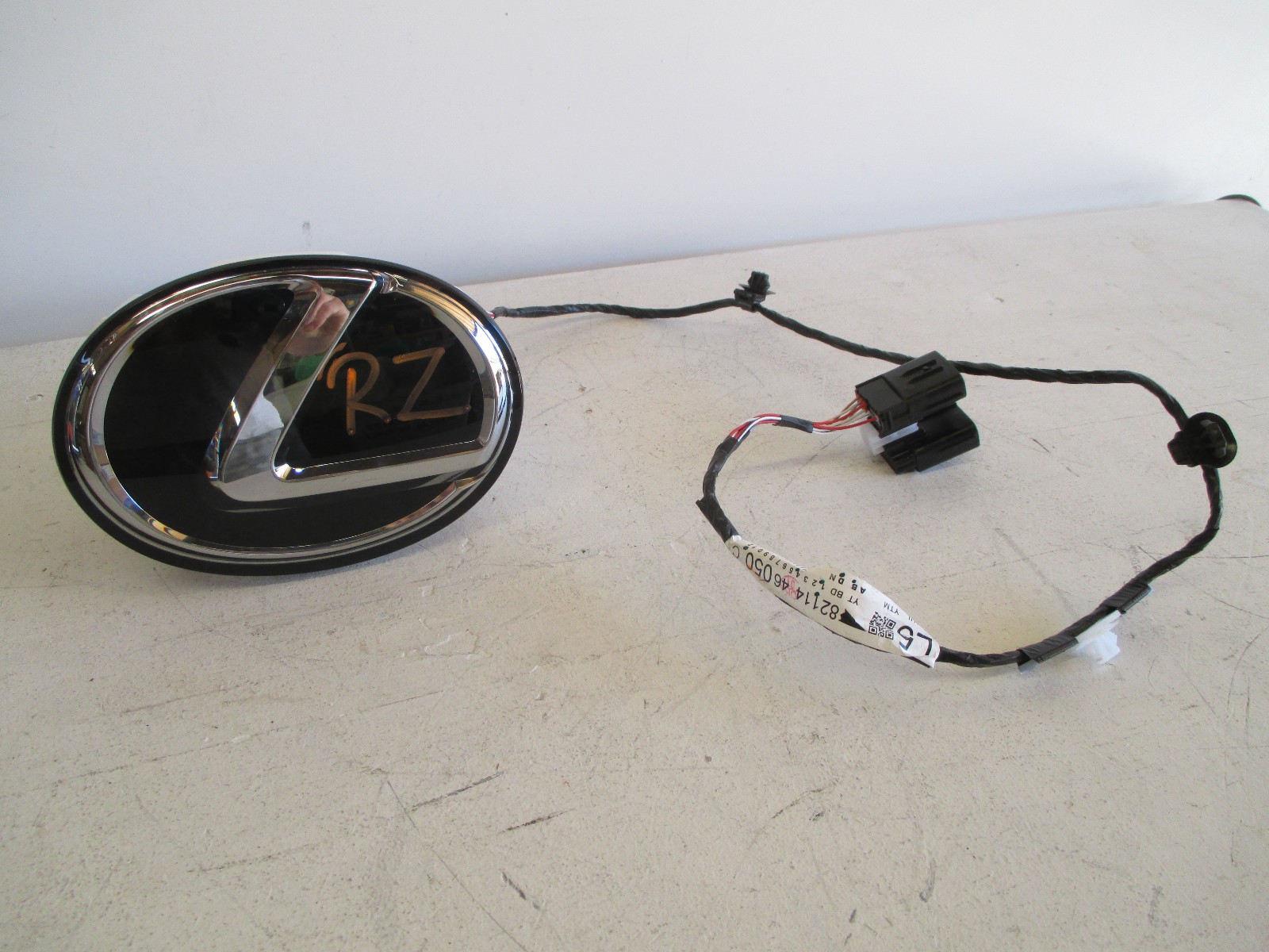 2023-2024 LEXUS RZ300e Front Distance Sensor, Emblem Assembly OEM 7540346020