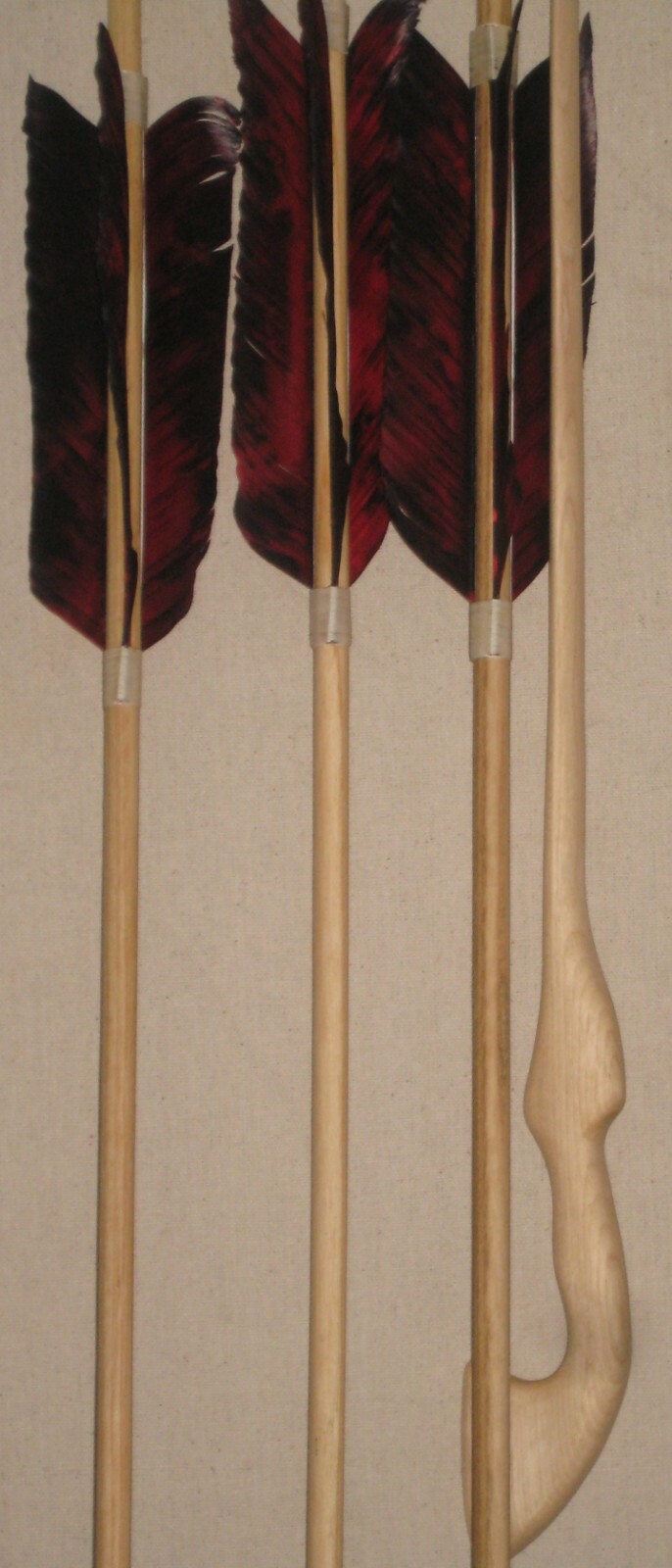 Catatonk Atlatl with three six foot darts manufactured by Thunderbird Atlatl