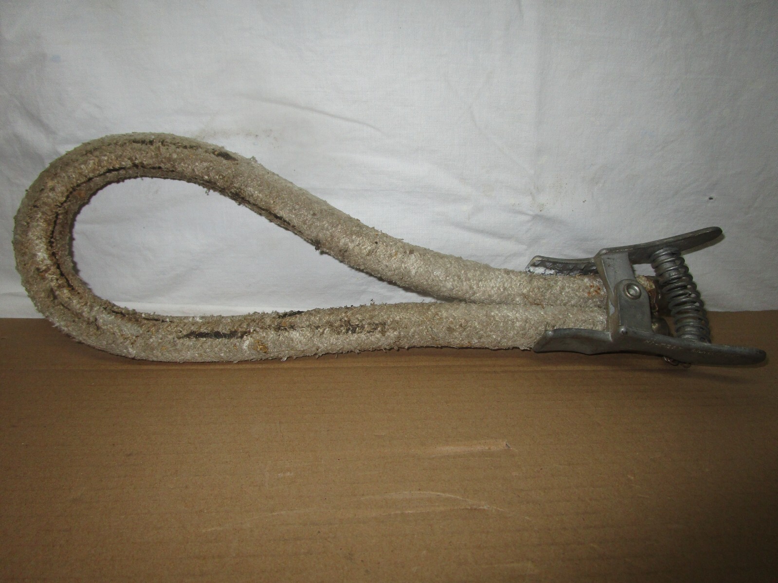 Vintage plumber's cast iron waste pipe molten lead pouring sealing dam