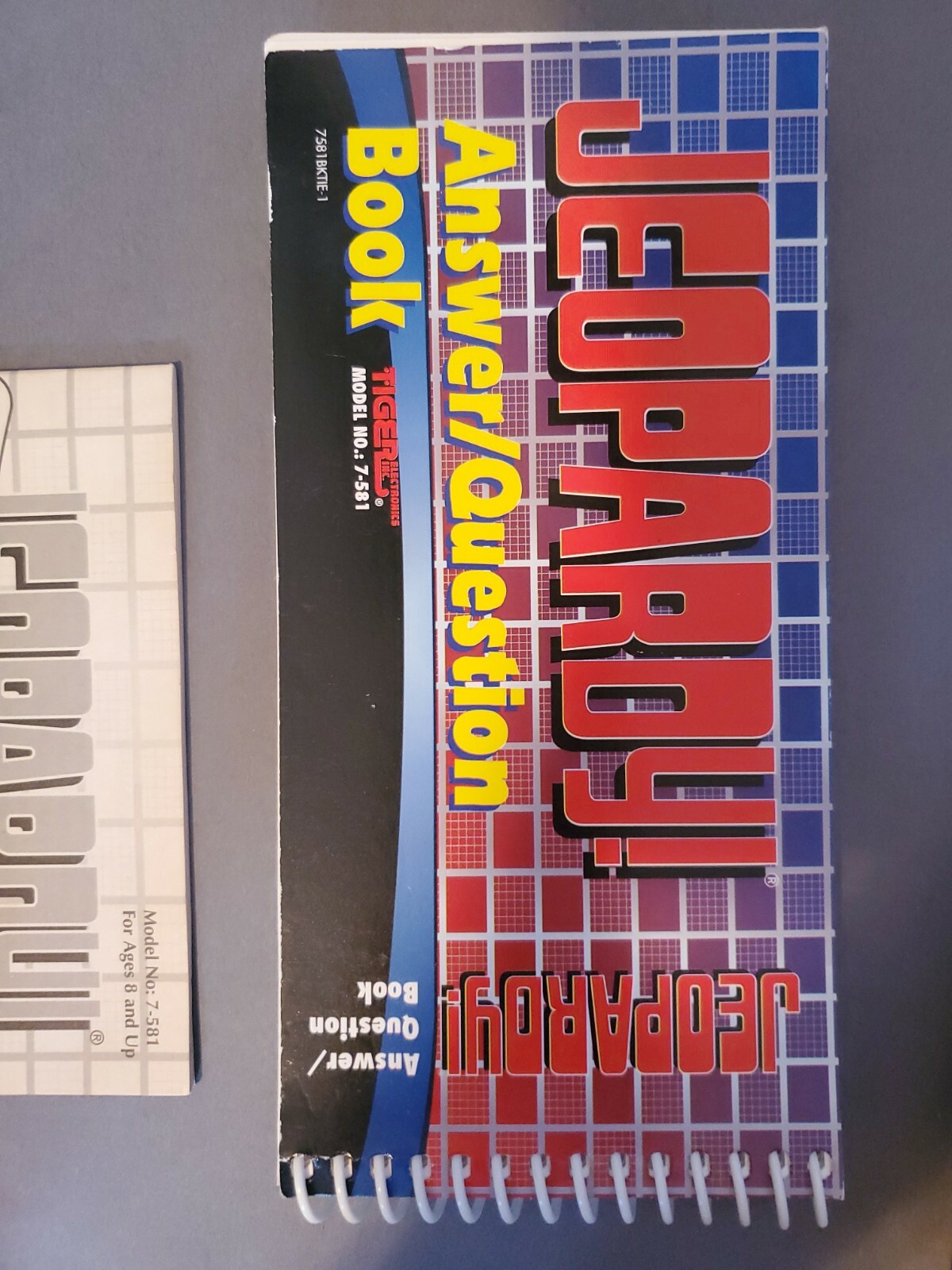 Jeopardy Electronic Handheld Game with Cartridge and Book Tiger Electronics 1995