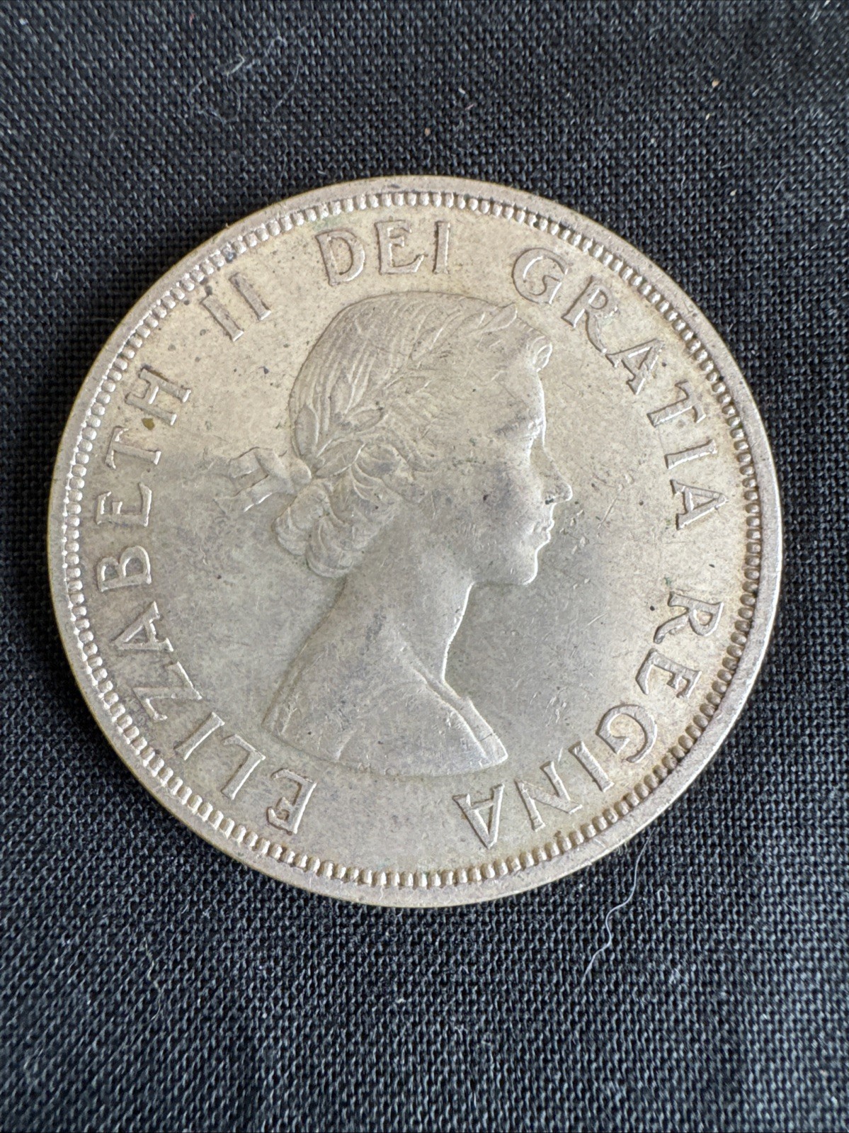 1958 canadian totem pole silver dollar