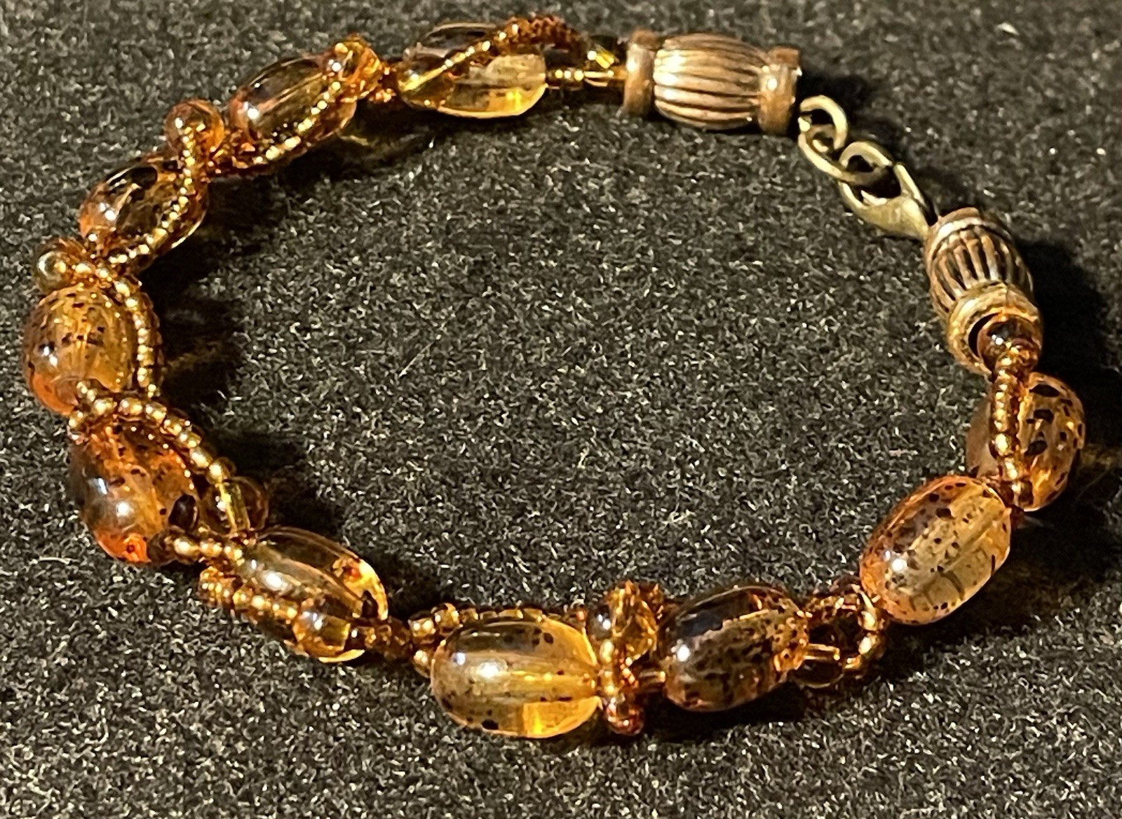 Handcrafted amber toned Oval acrylic Beads; tiny & 3mm glass amber toned beads