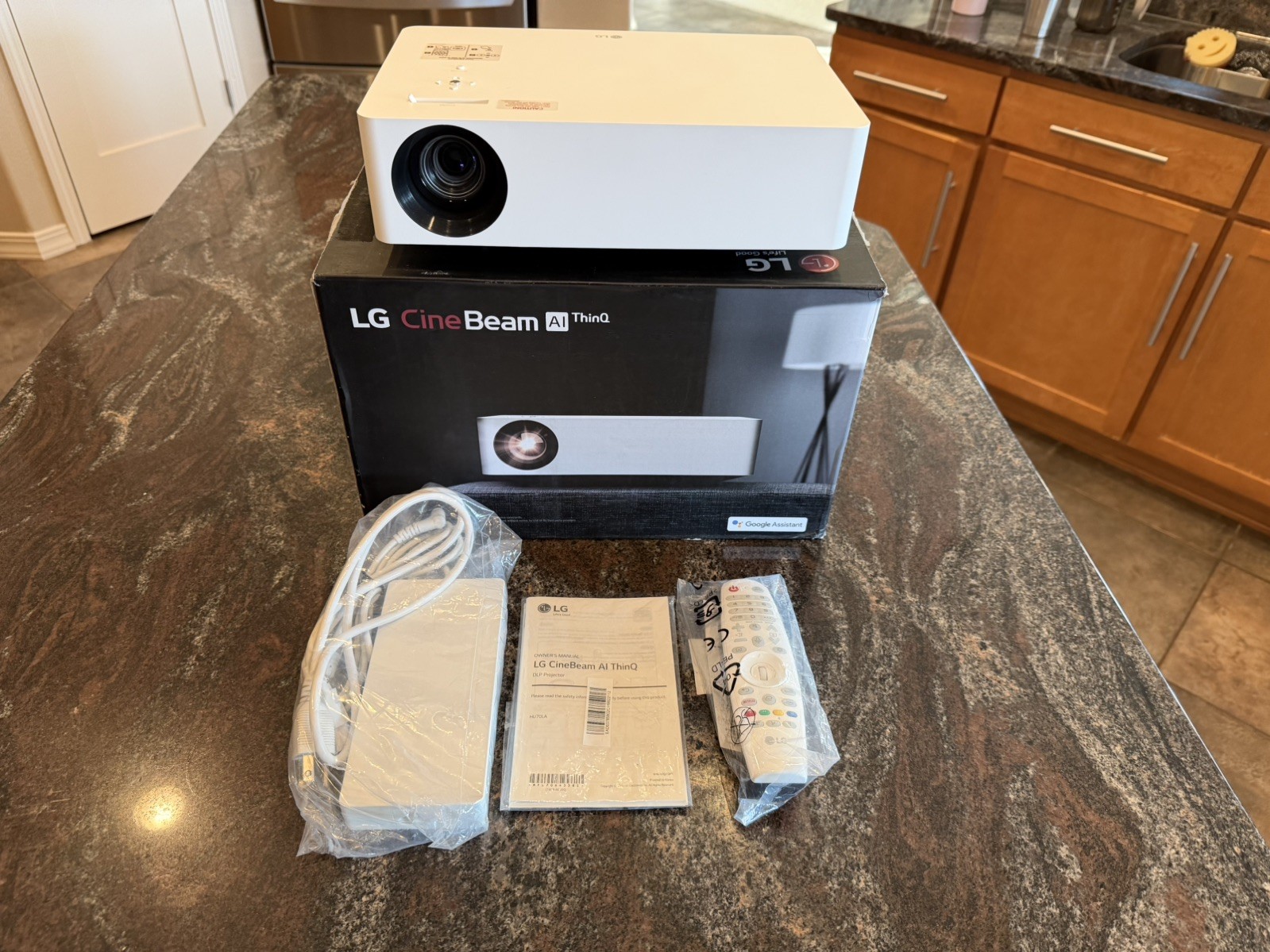 LG HU70LA 4K UHD CineBeam Projector — Complete with only 111 hours of use