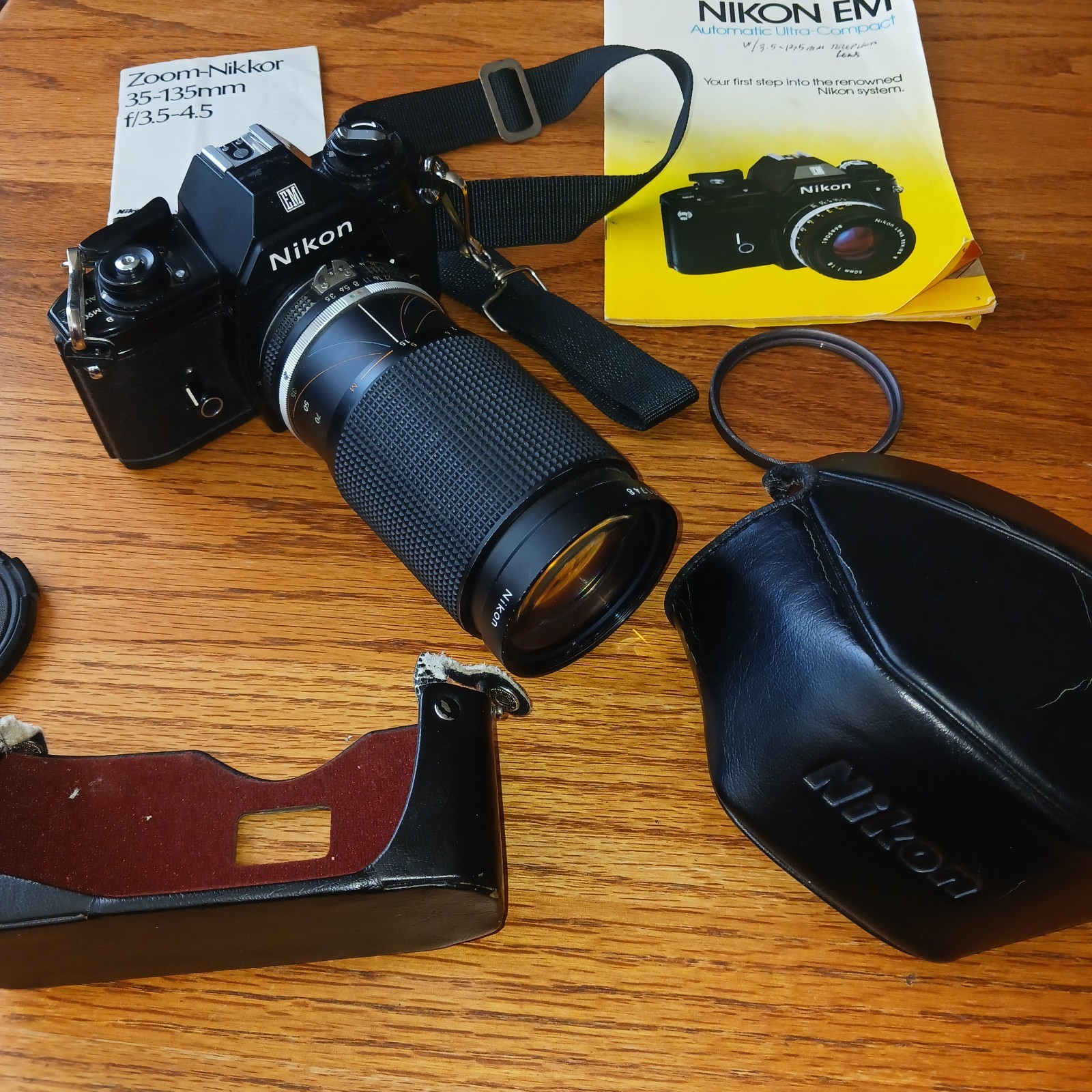 Nikon EM 35mm + Zoom-Nikkor 35-135mm 1:3.5-4.5 + Manuals Working