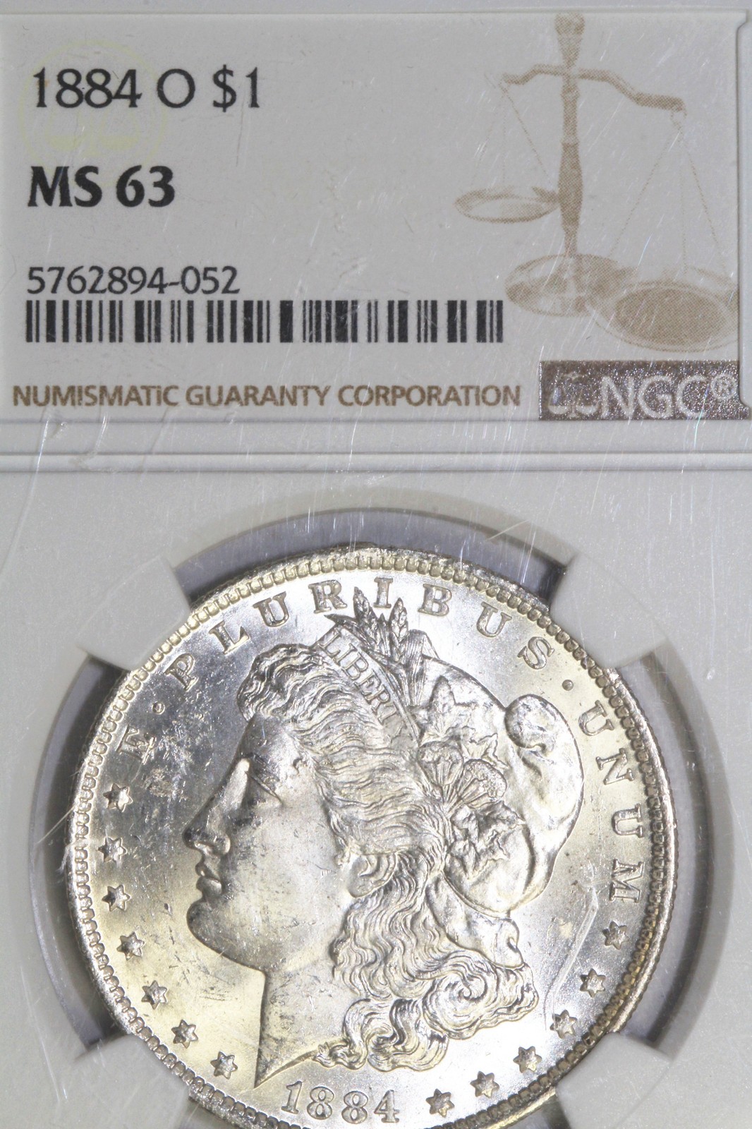 1884-O Morgan 90% Silver Dollar Graded NGC MS63 (5762894-052)