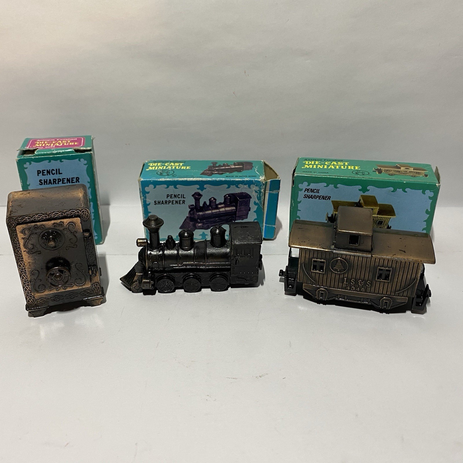 Vintage Die Cast Pencil Sharpeners Lot Of 3, Safe, Train Engine, Caboose In Box
