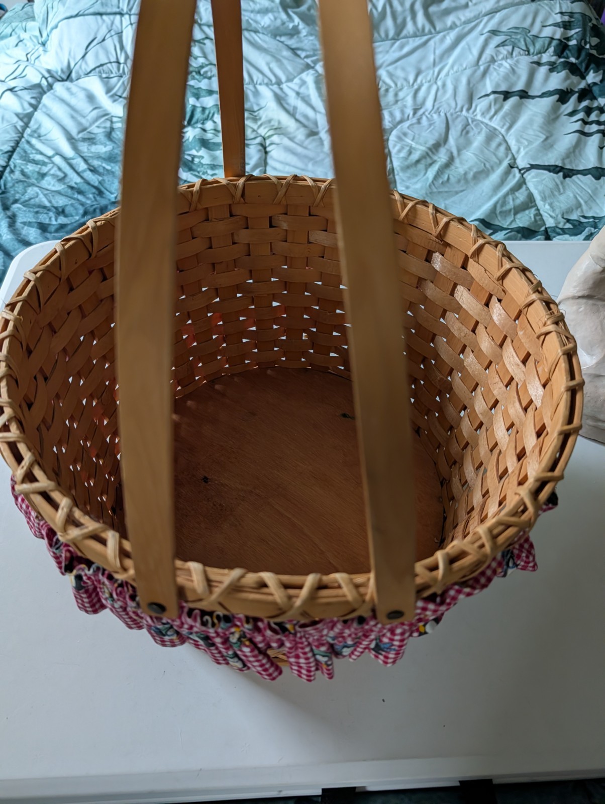 PREOWNED WEAVED BASKET WITH HANDLES AND CLOTH RIMMER ACCENT 15.5 X 9.5