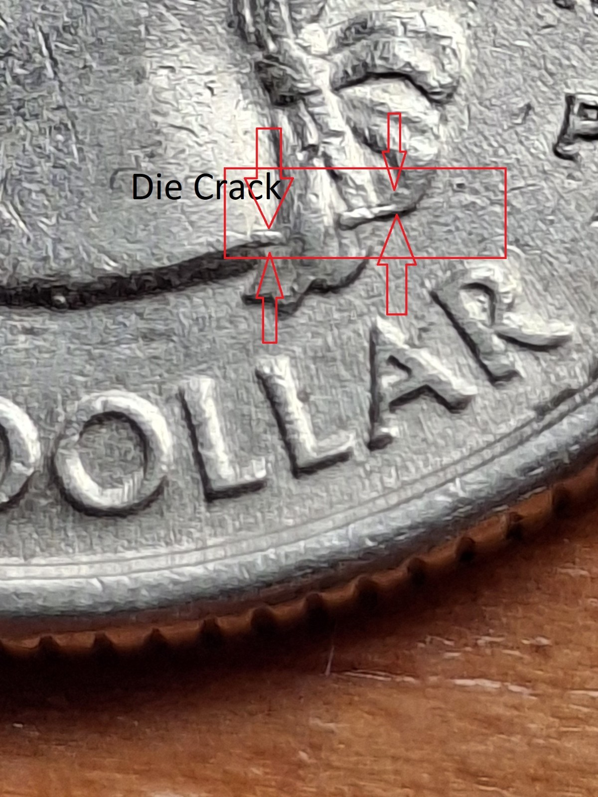 1999P Connecticut Quarter Obverse die crack around the Initial