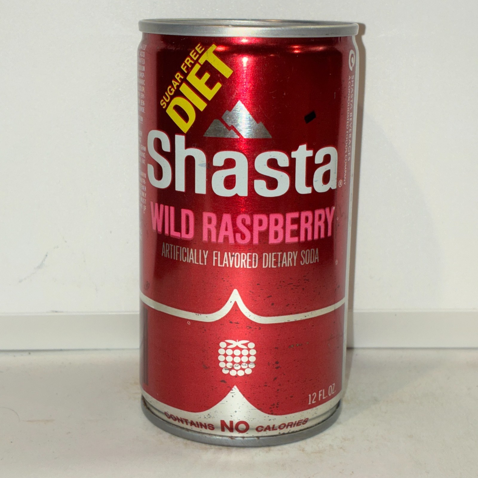 Shasta Diet Wild Raspberry Soda can, crimped steel, bottom opened