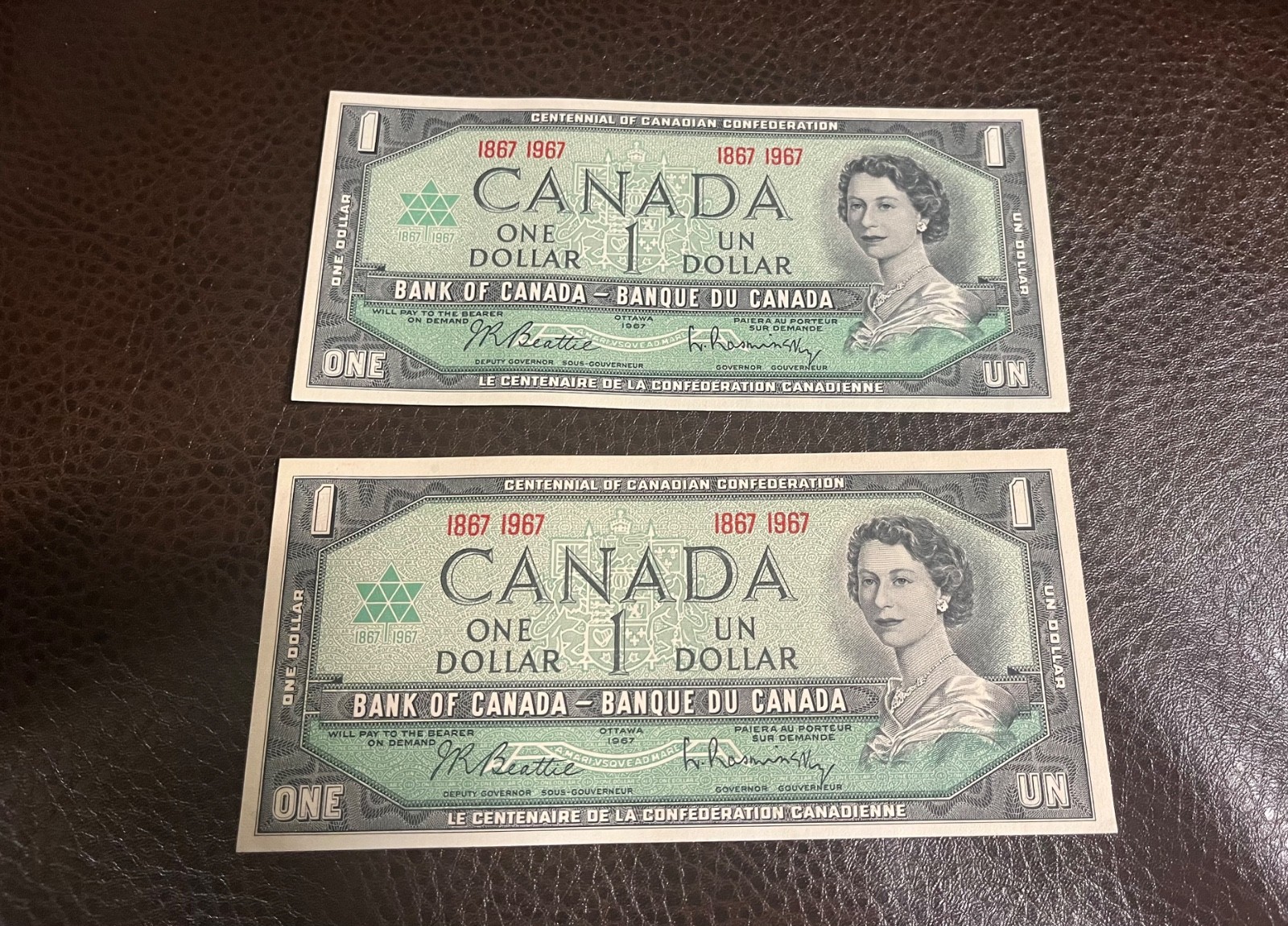 (2) 1967 CANADA - 1 DOLLAR (CENTENARY) - UNC