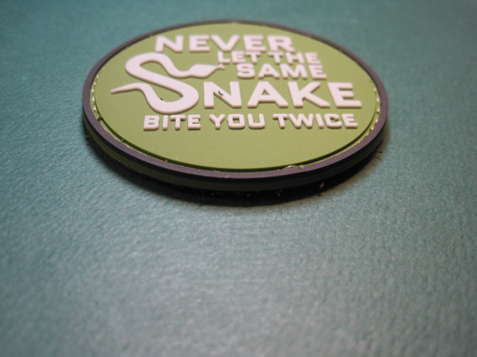 MORALE PATCH "NEVER LET THE SAME SNAKE BITE YOU TWICE" HOOK BACK GREAT DETAIL!