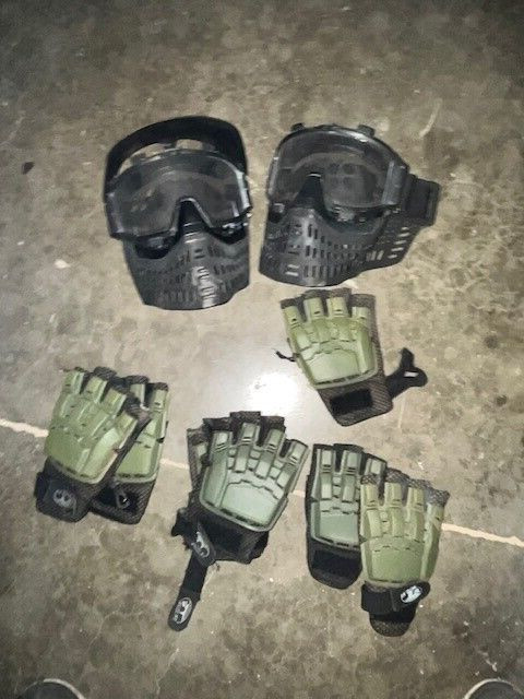 2 JT PAINTBALL MASKS WITH 3 AND 1/2 PRS OF LA GLOVES BRANDED GLOVES