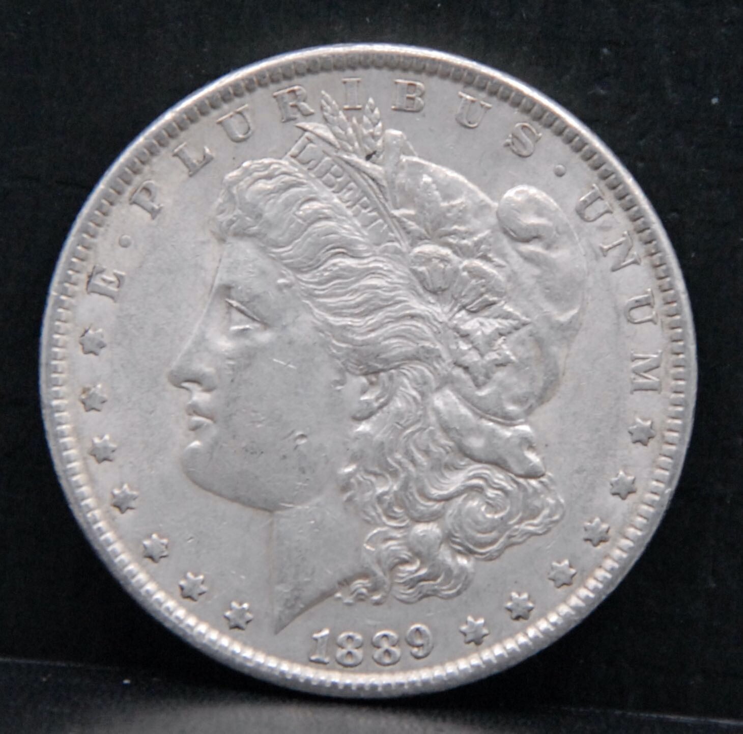 1885-O Morgan Silver Dollar - Almost Uncirculated Condition