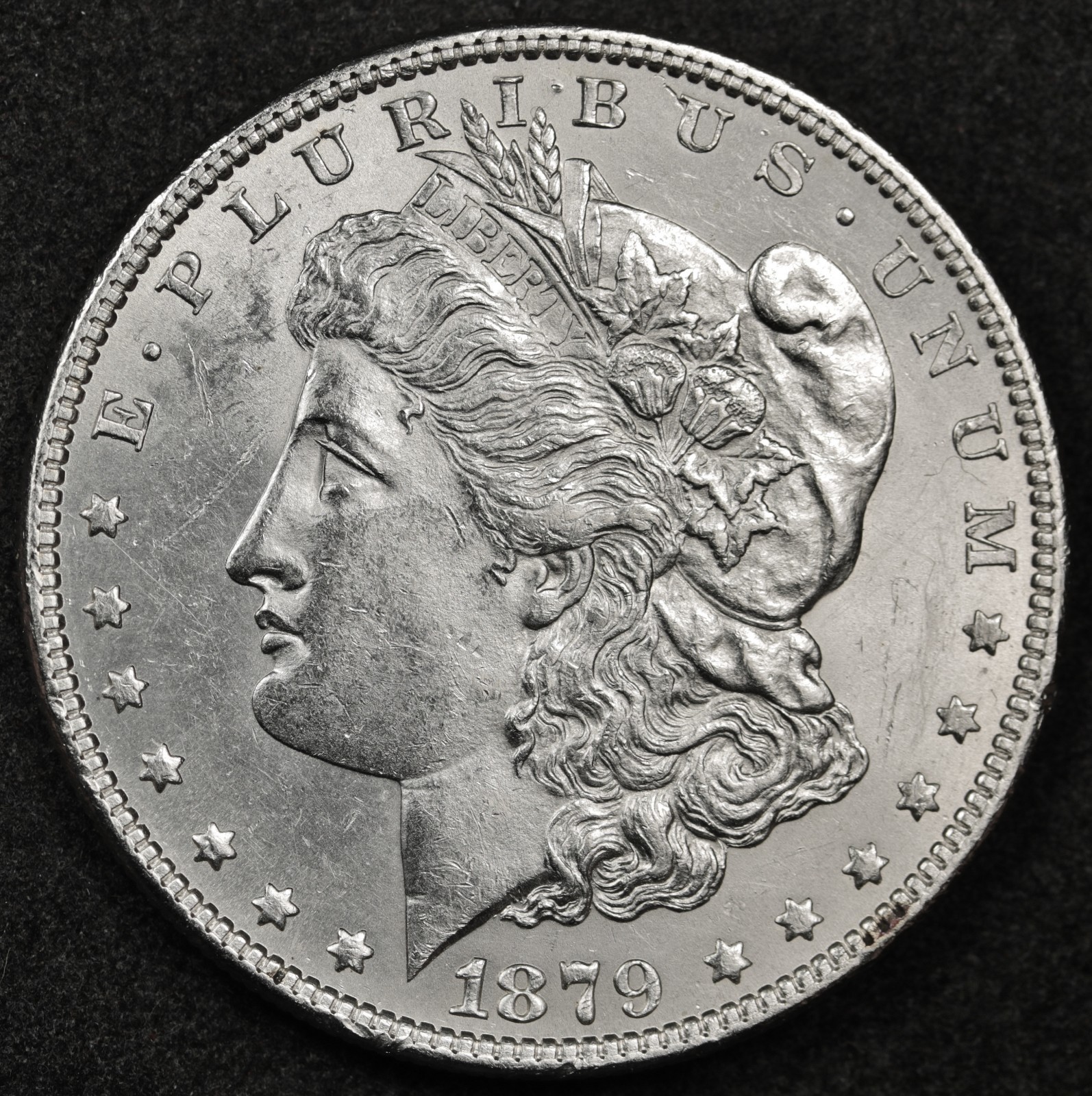 1879 Morgan Silver Dollar.  B.U.  Inventory G.