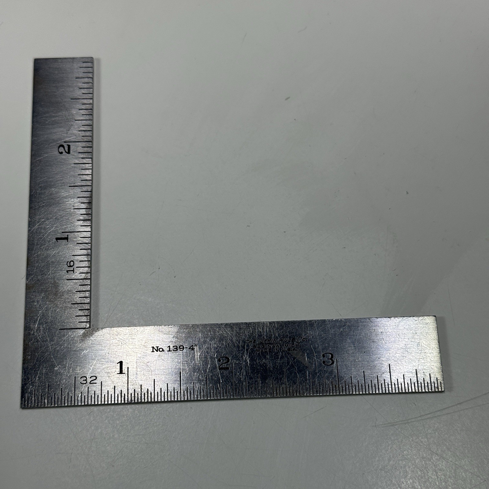 The LUFKIN Rule Co. No. 139-4"  4 x 3 Inch Thin Steel Square. Made in the USA