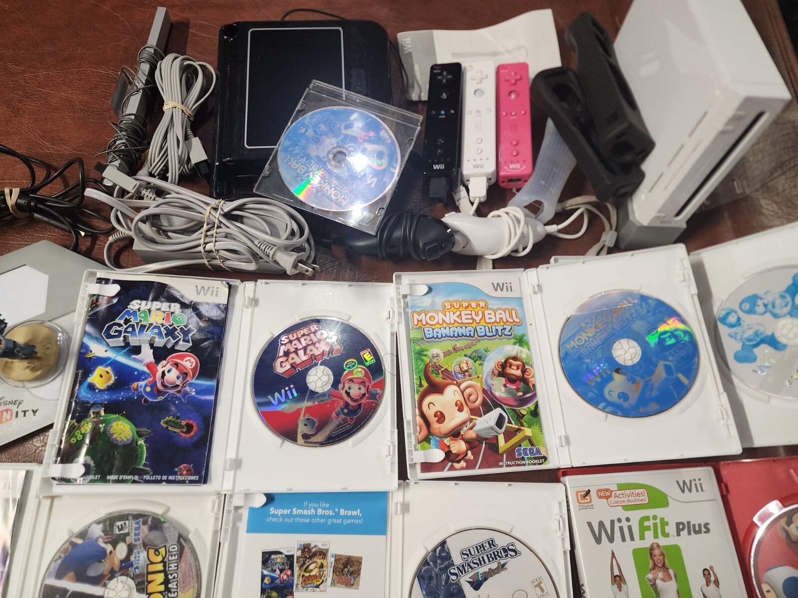 Wii Console plus, 9 games, 2 remotes, 1 nunchuck, System Plus Hookups & More