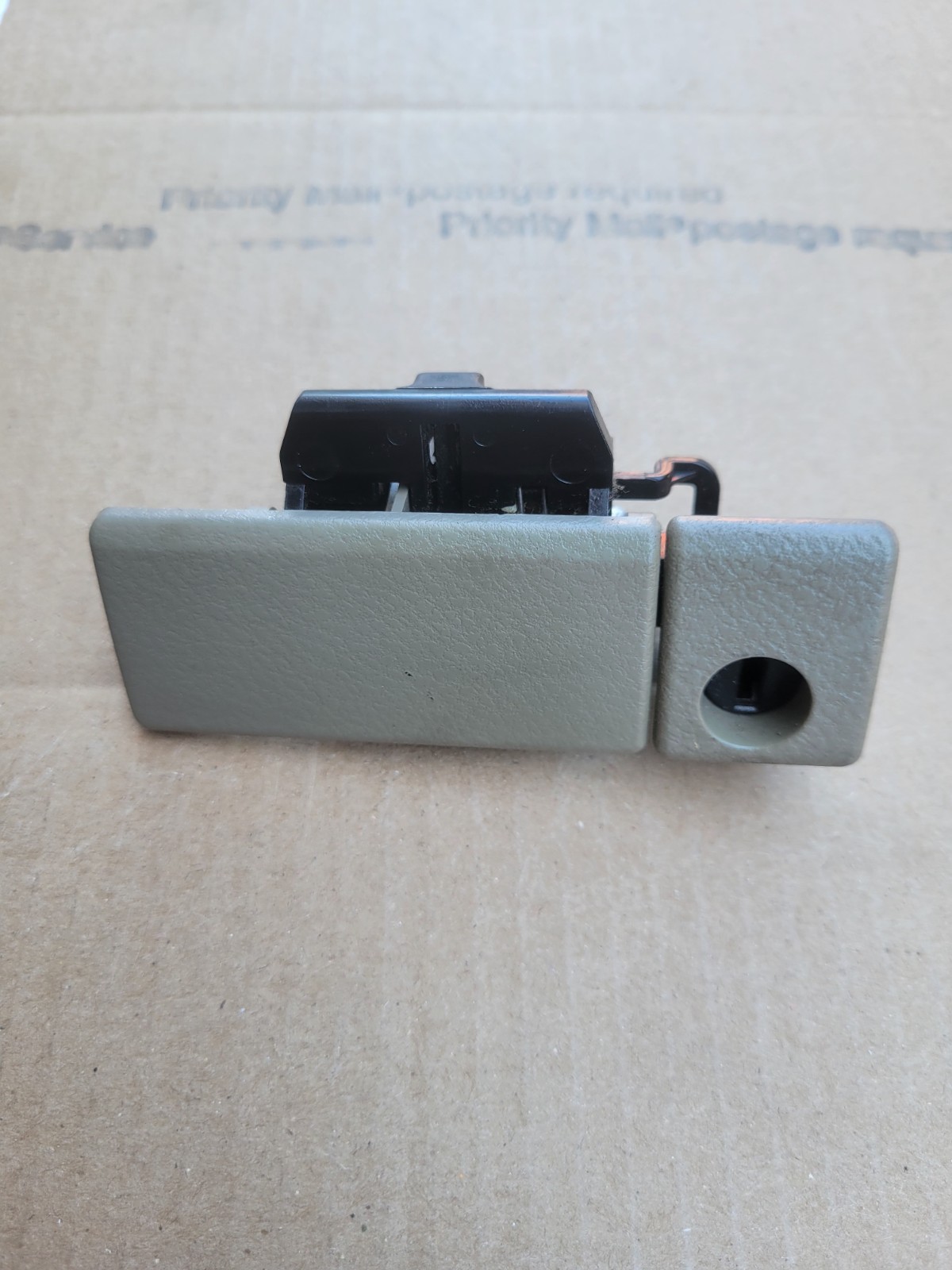 2006 to 2013 Suzuki Grand Vitara Glove Box Latch Handle Factory OEM color BEIGE