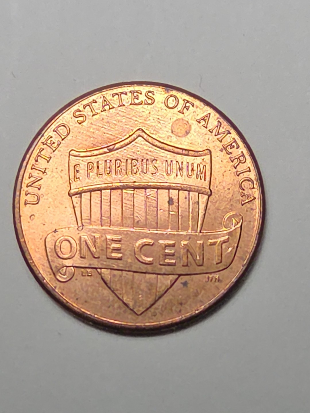 2015 P Penny with Die Chip Error on Reverse Top of Shield
