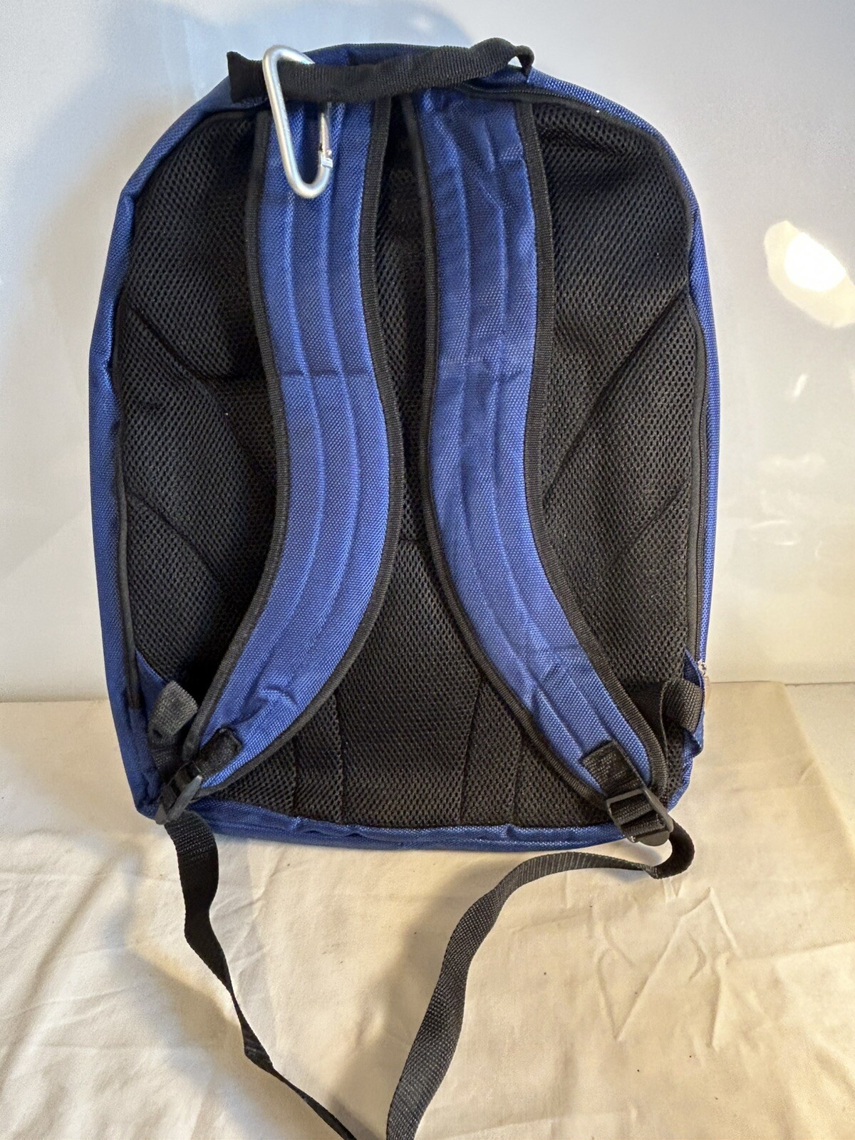 Blue/Grey NGG Swiss Edition Backpack with blue water bottle computer school