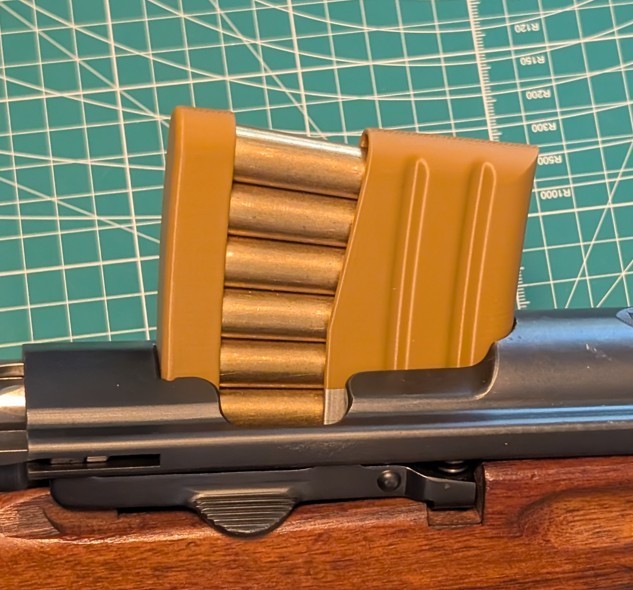 A set of (4) Performance‑Optimized Charger (Stripper) Clips for Swiss K31 Rifles
