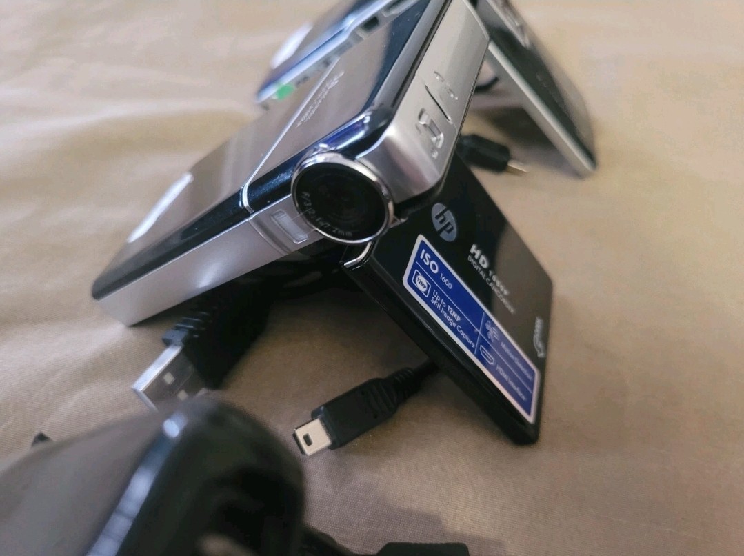 TEN Portable Handheld Camcorders In (Excellent Condition) w/ cords and case