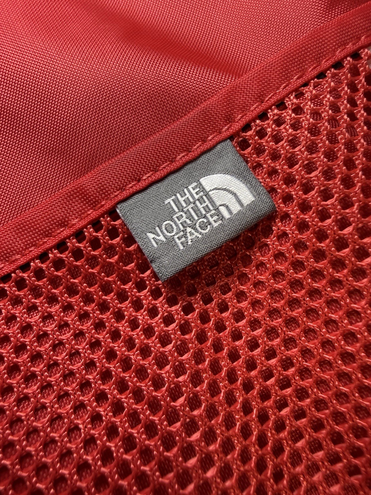 The North Face Mountain Athletics On The Run Bag Red Gray 23L Mesh Pocket