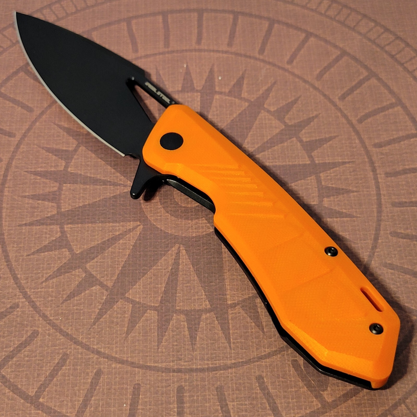Real Steel Pelican Knife Tactical Flipper Frame Lock Orange & Black Handles