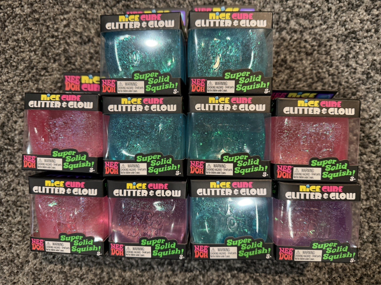 SCHYLLING NeeDoh AUTHENTIC Nee Doh Nice Cube Glitter & Glow Squish Pink Blue