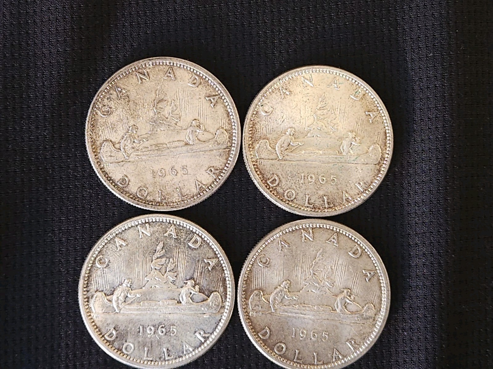 Lot of 4 Canadian Silver Dollars