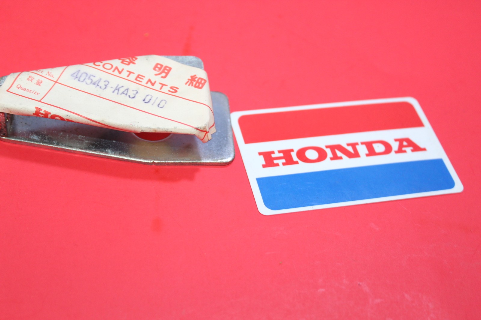NOS HONDA SWINGARM CHAIN ADJUSTER CR125R CR125 CR250R CR500R OEM # 40543-KA3-010
