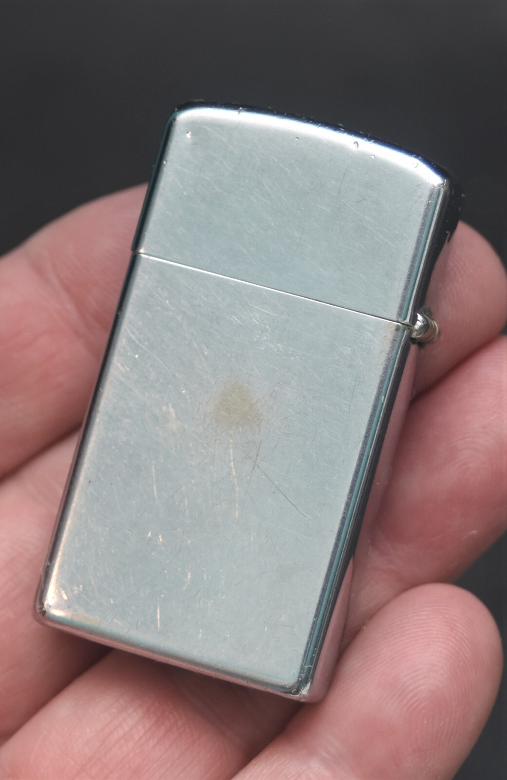 VINTAGE CHAMPLIN KEEPS THINGS MOVING ZIPPO SLIM FLAT BOTTOM IIII IIII