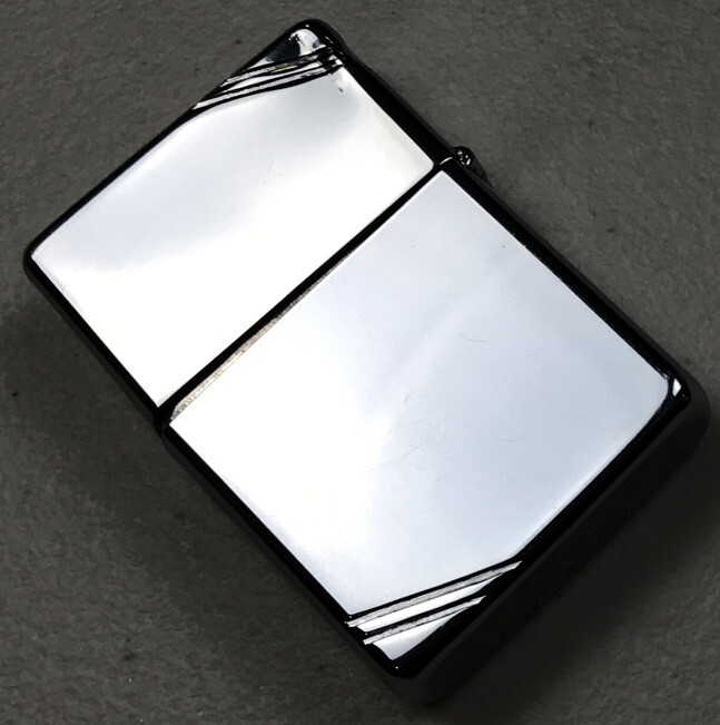 Unusual Style ZIPPO, Diagonal Cut Slashes On Corners. High Chrome Finish. Works