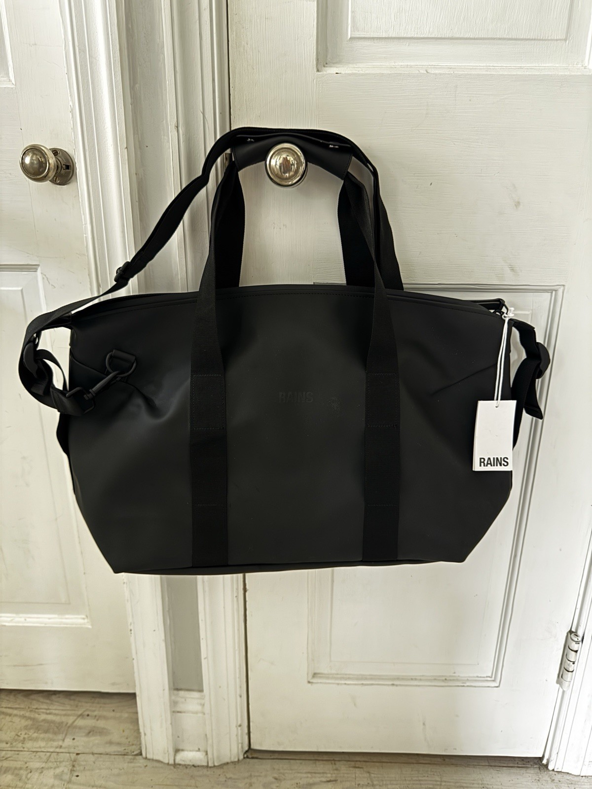 RAINS small weekend waterproof duffle bag black adjustable new with tags**