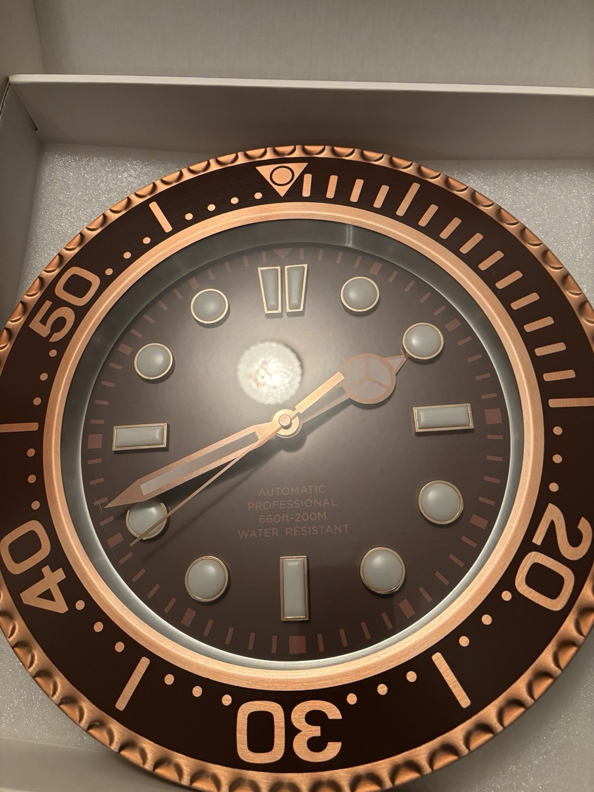 Invicta Brown And Gold, Automatic, And Water Resistant Up To 200M Wall Clock