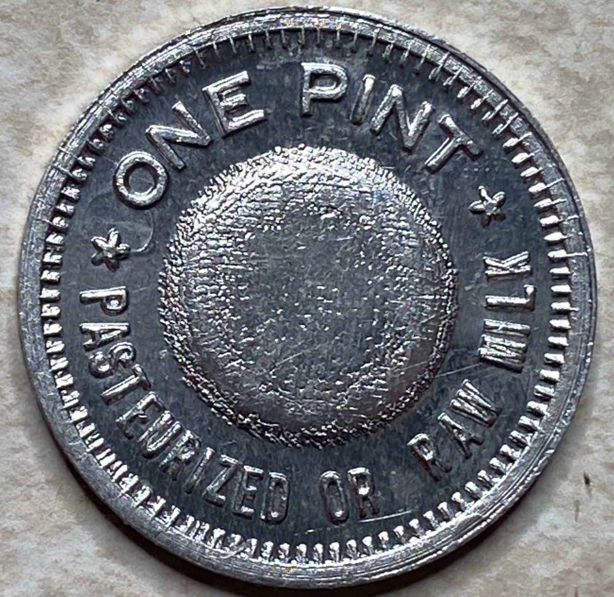 T9155 One Pint Pasteurized or Raw Milk, Unknown  Anillo Restrike Arcade Token