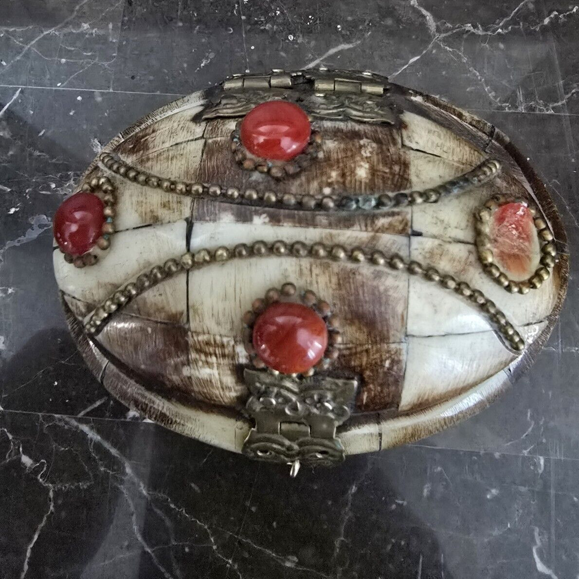 Interesting Trinket Box from Travels Brass features