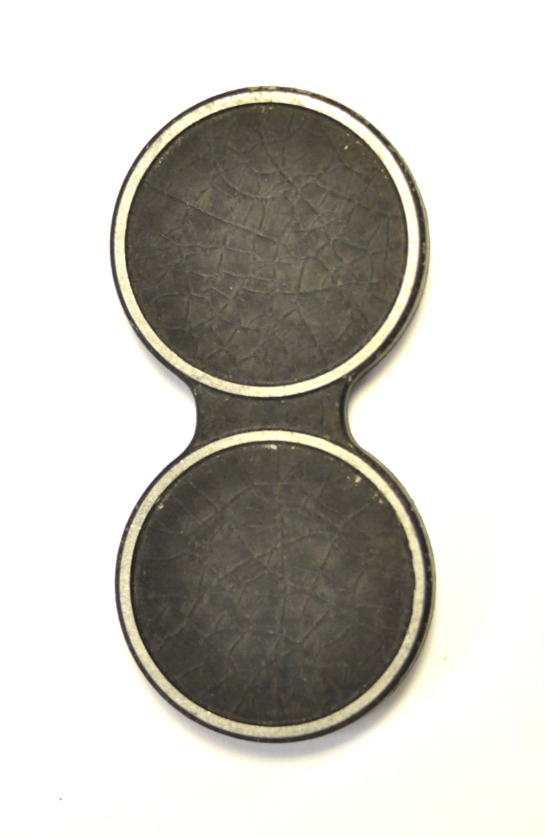 Unbranded aluminum push-on lens cap for a TLR camera.