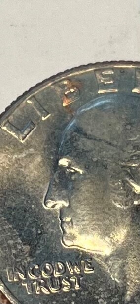 1966 Washington Quarter — copper showing on obverse