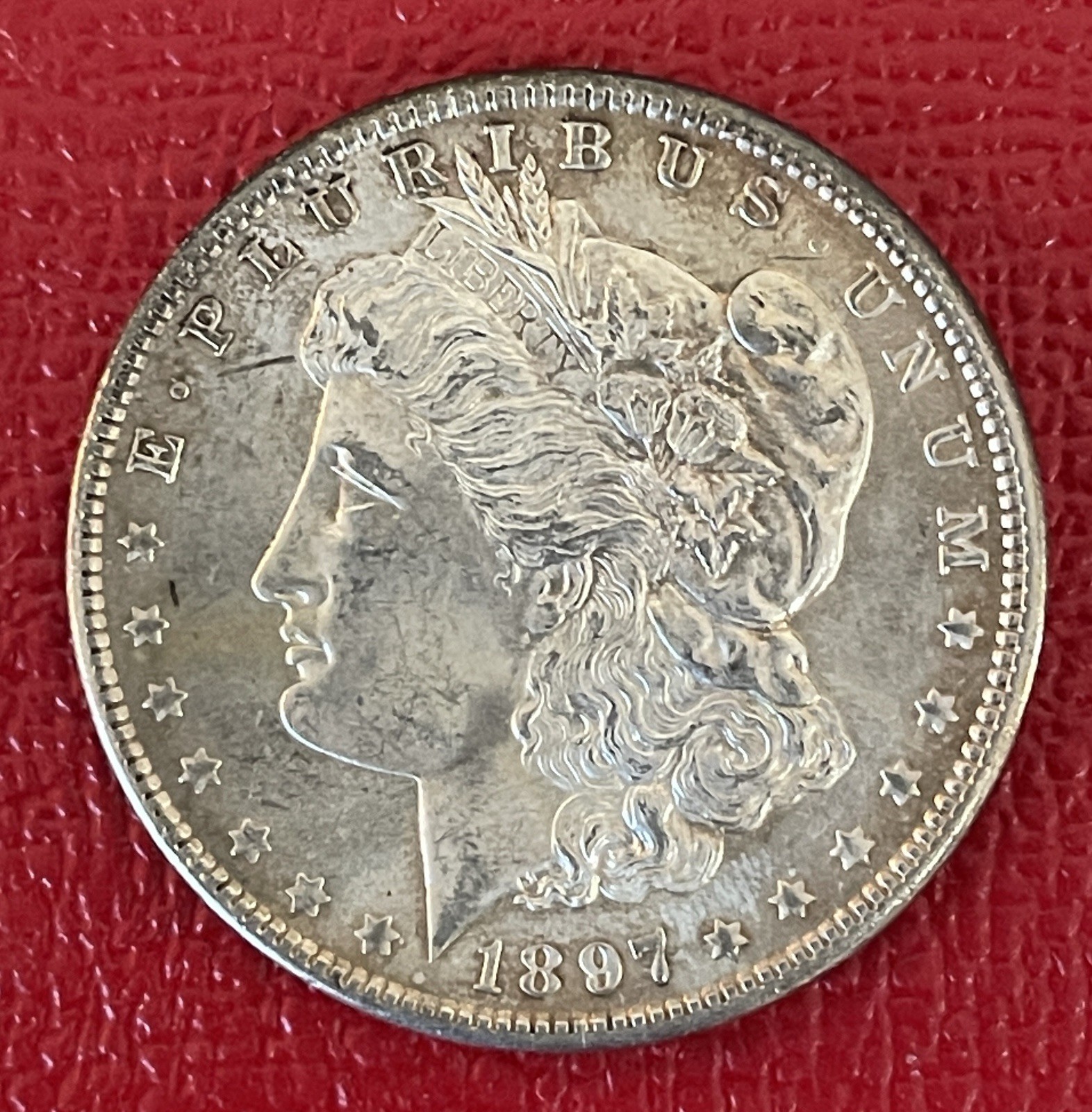 1897 P Morgan Silver Dollar, Choice to Gem Uncirculated.