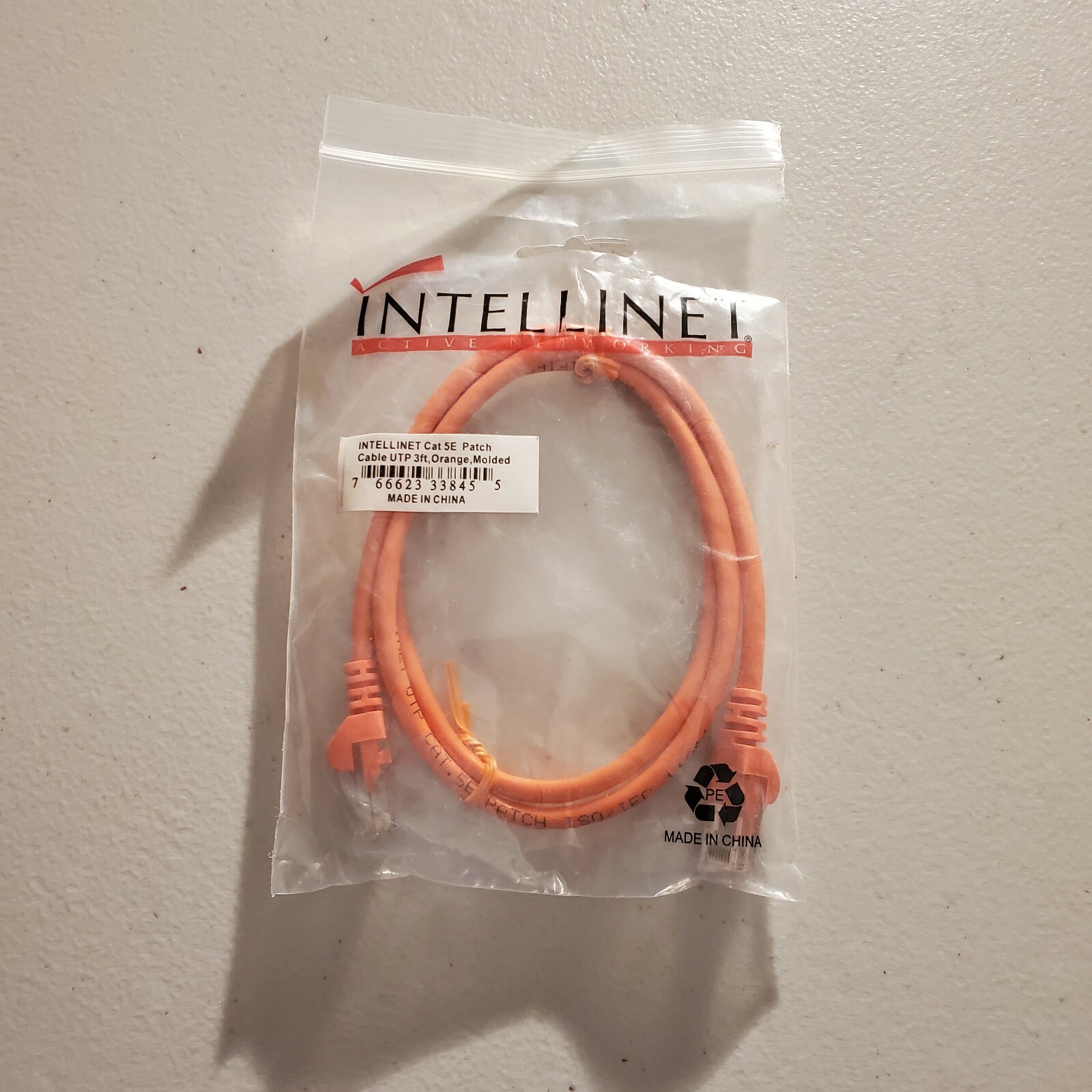 Intellinet Network Solutions Cat5e UTP Network Patch Cable, 3 ft (1.0 m), Orange