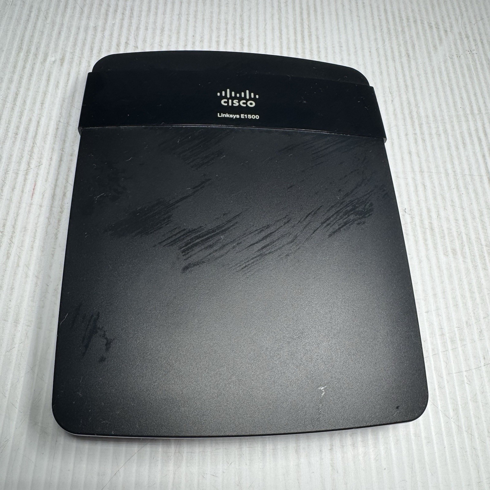 Cisco Linksys E1500 300 Mbps Wireless‑N Router 4‑Port Gigabit Switch Unit Only