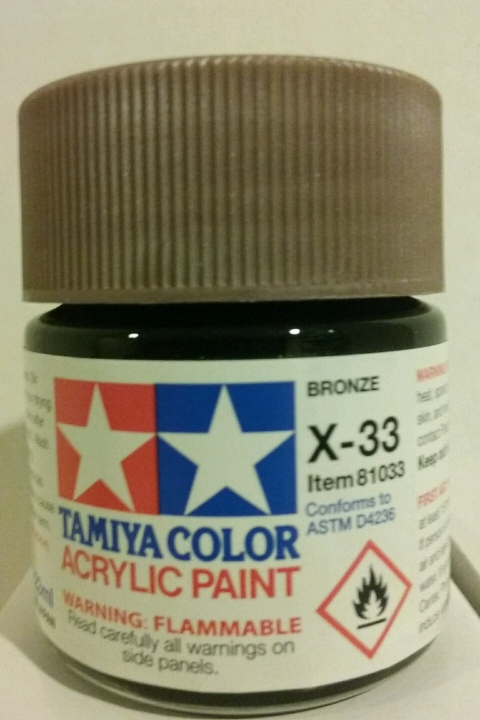 Tamiya acrylic paint.  X-33 Bronze. 23ml