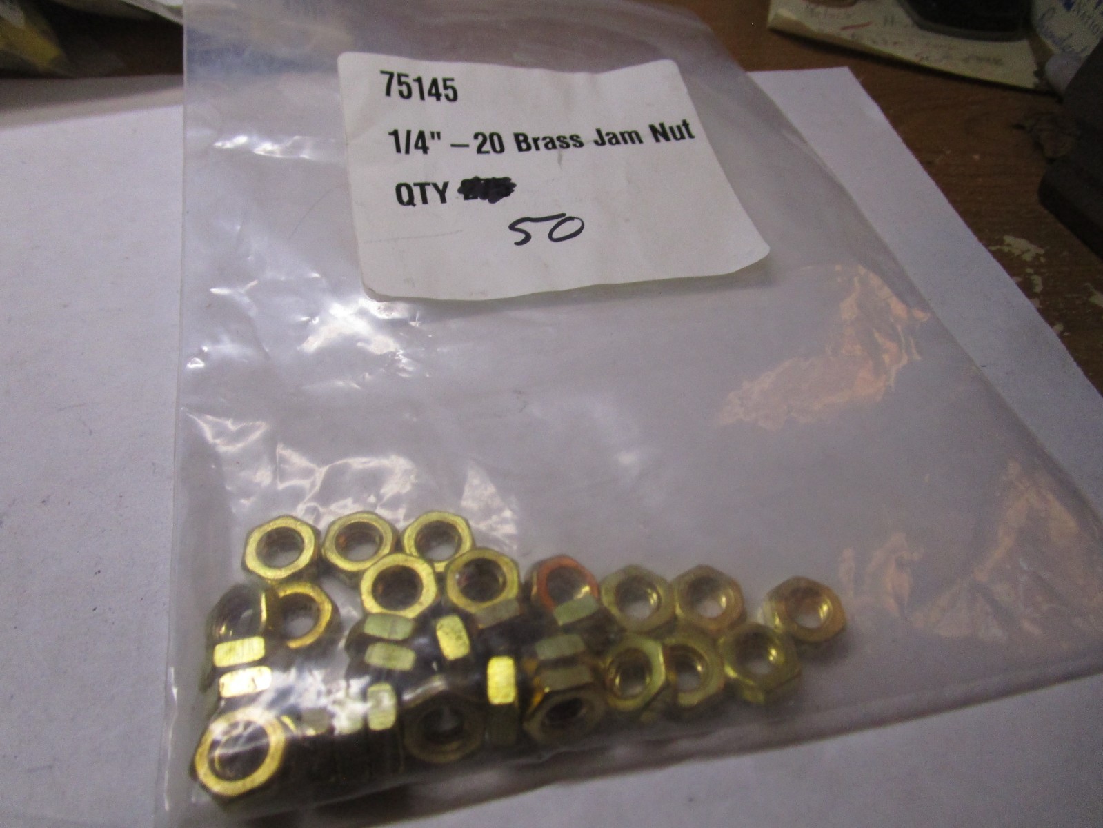 1/4"-20 ASTM F467 Plain Finish Brass Jam Nut QTY 30