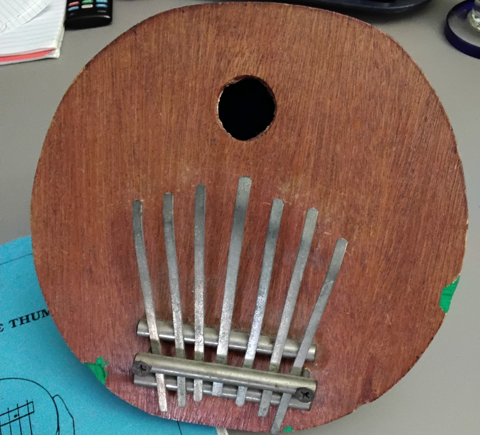 Half Coconut Thumb Piano With Learners Guide.